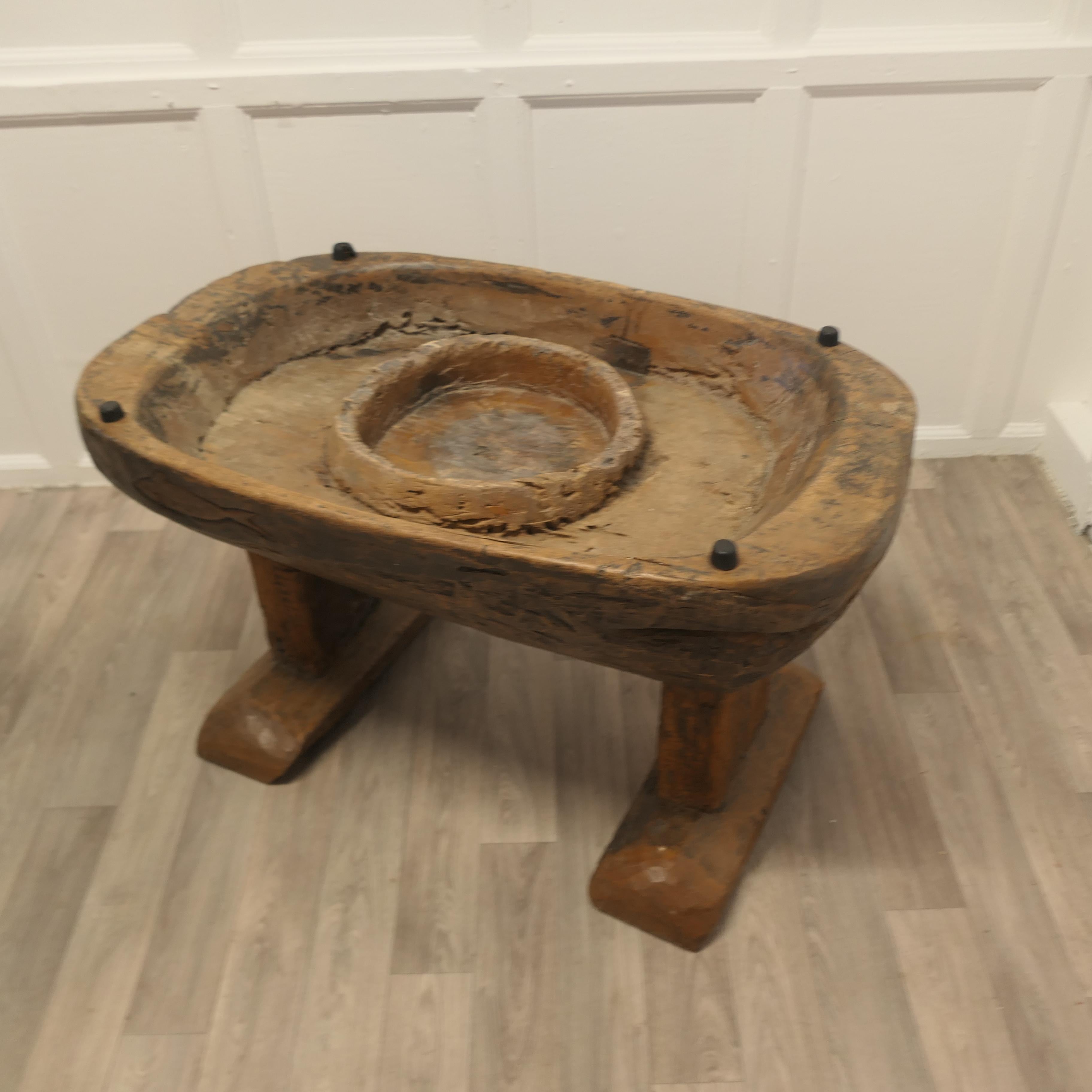  Ancient Preparation Table, Now Rustic Coffee Table

This is a splendid ancient piece, it is very heavy and carved from the tree, it has a large bath and a smaller central bowl, all set on very strong and chunky legs. The table has been made for the