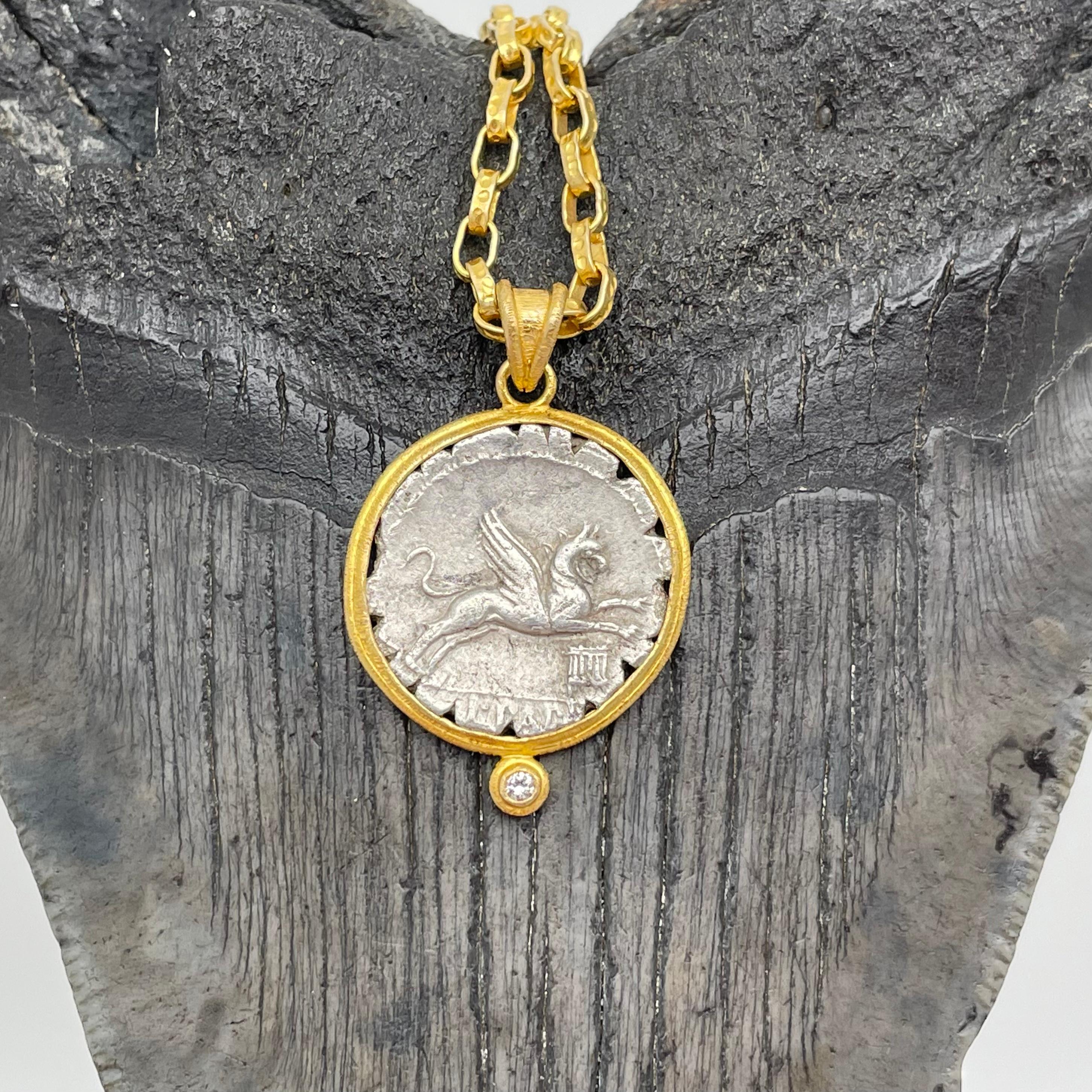 An interesting authentic silver denarius coin from the period of the Roman Republic 79 BC, featuring a griffin leaping, is set in a Steven Battelle ancient inspired matte-finish textured bezel mount with 1.8mm VS1 diamond accent.  The denarius was