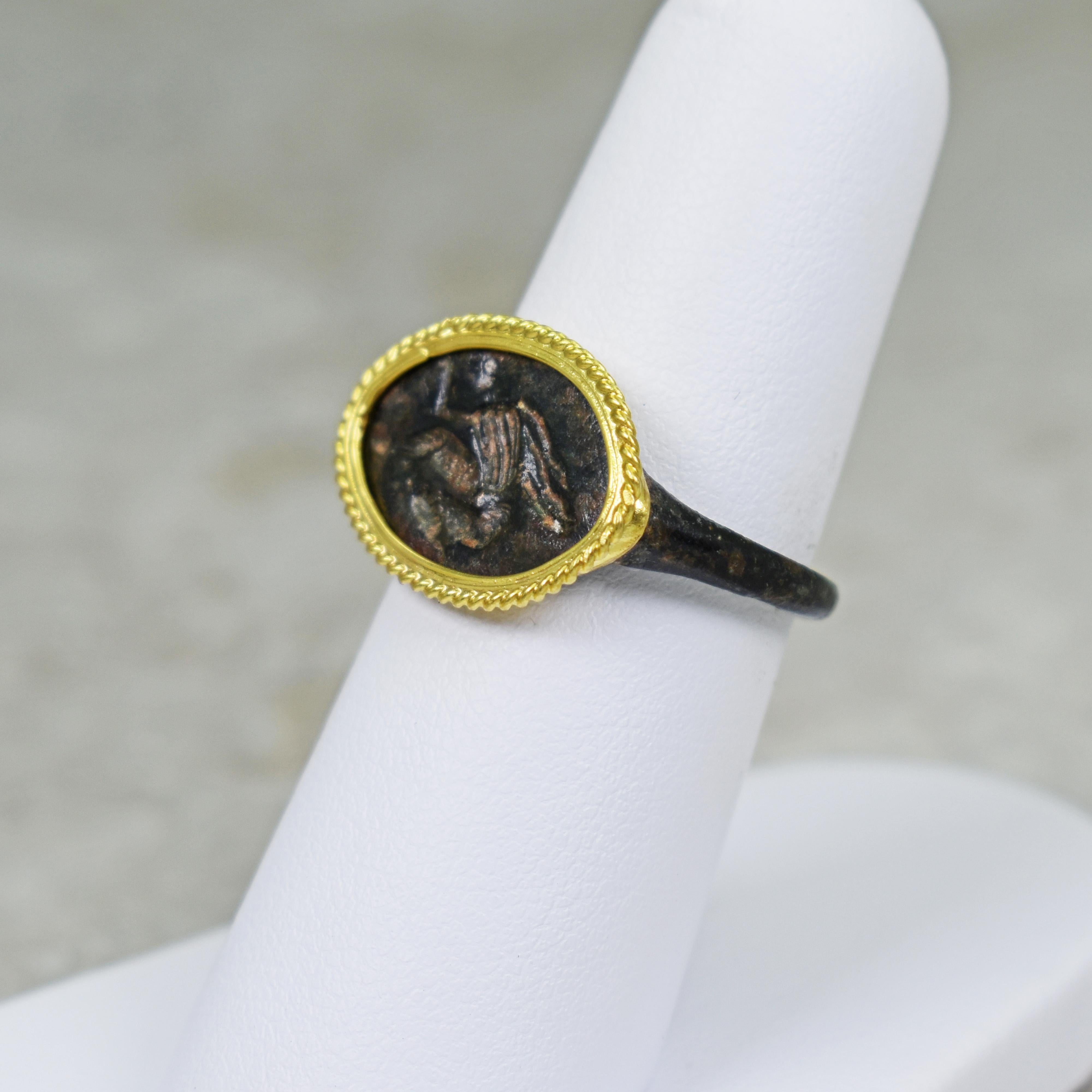 Classical Roman Ancient Roman Bronze Carved Signet Ring with 22 Karat Gold Rope Bezel For Sale