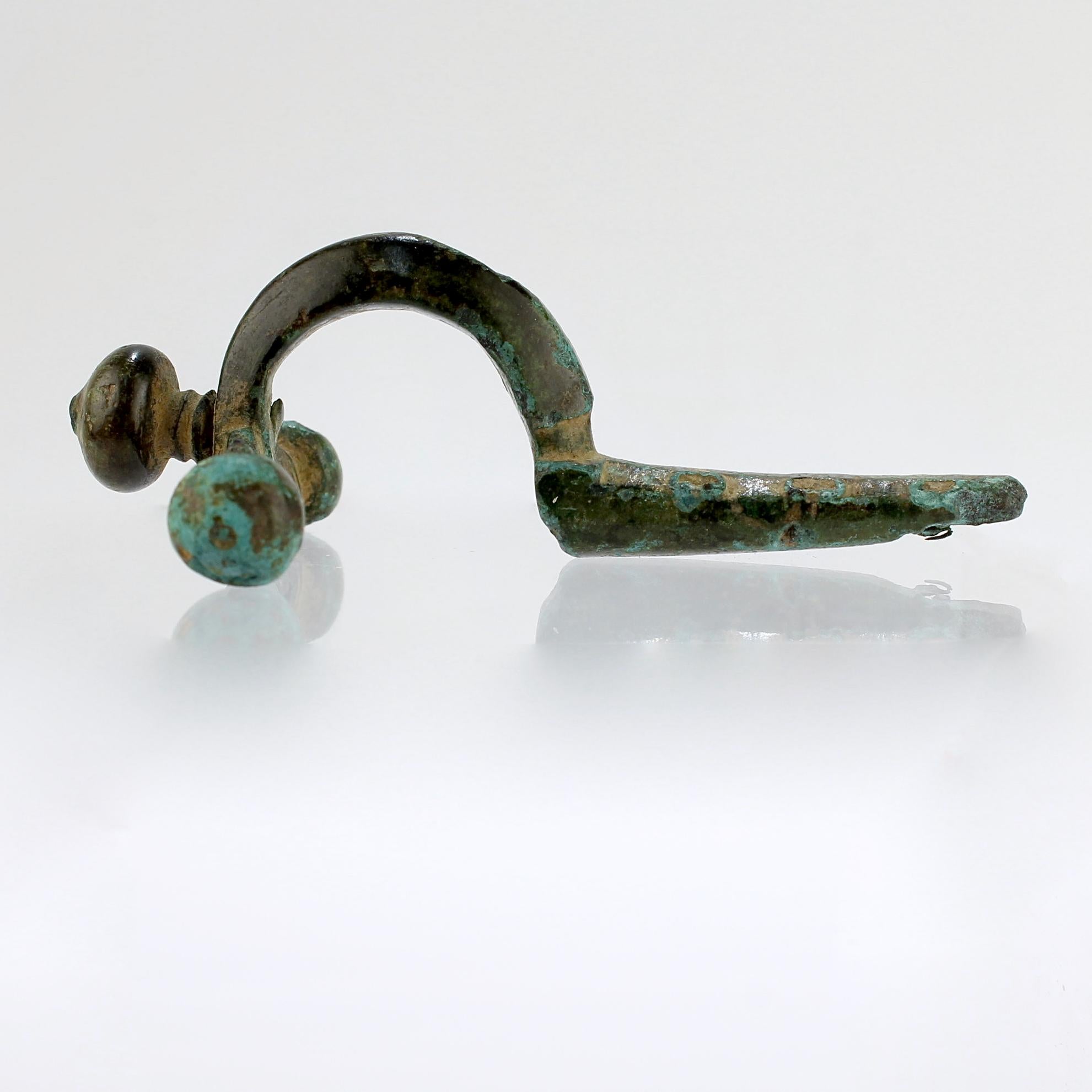 Ancient Roman Bronze Crossbow Fibula or Toga Pin For Sale 2