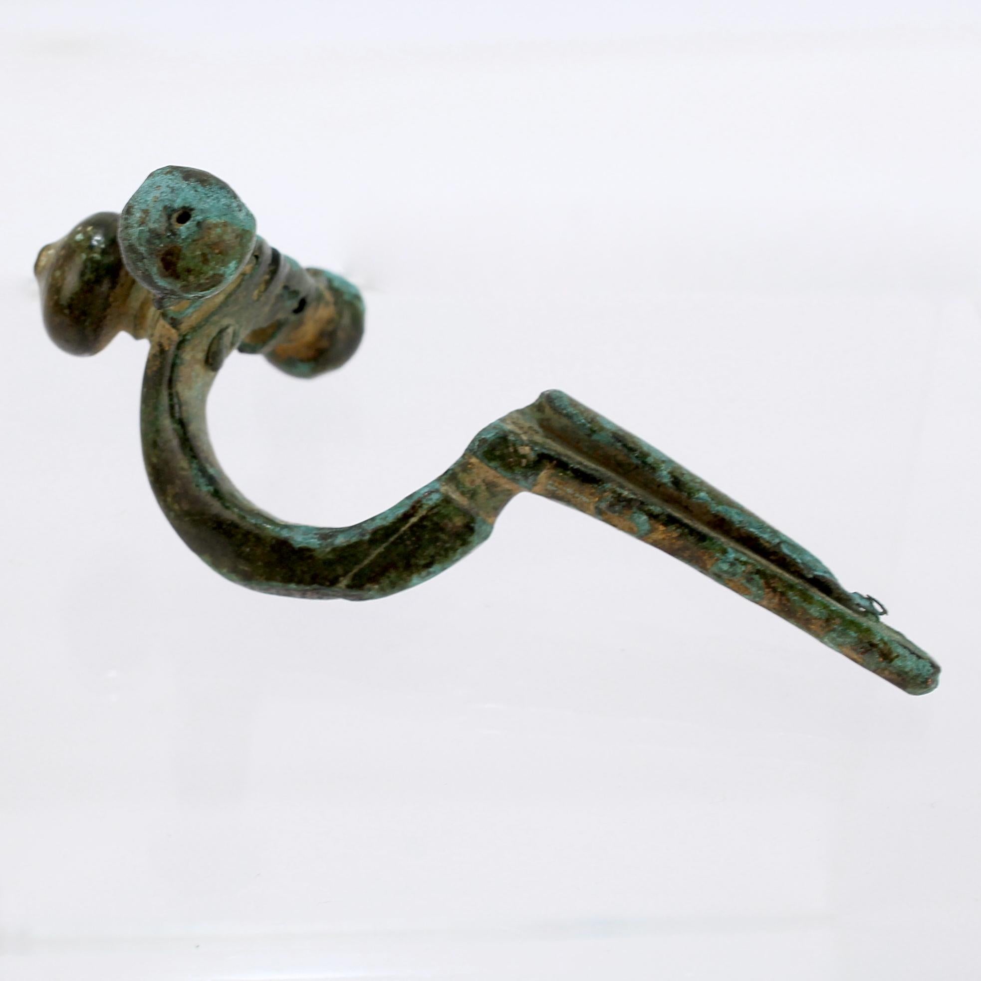 Ancient Roman Bronze Crossbow Fibula or Toga Pin For Sale 3
