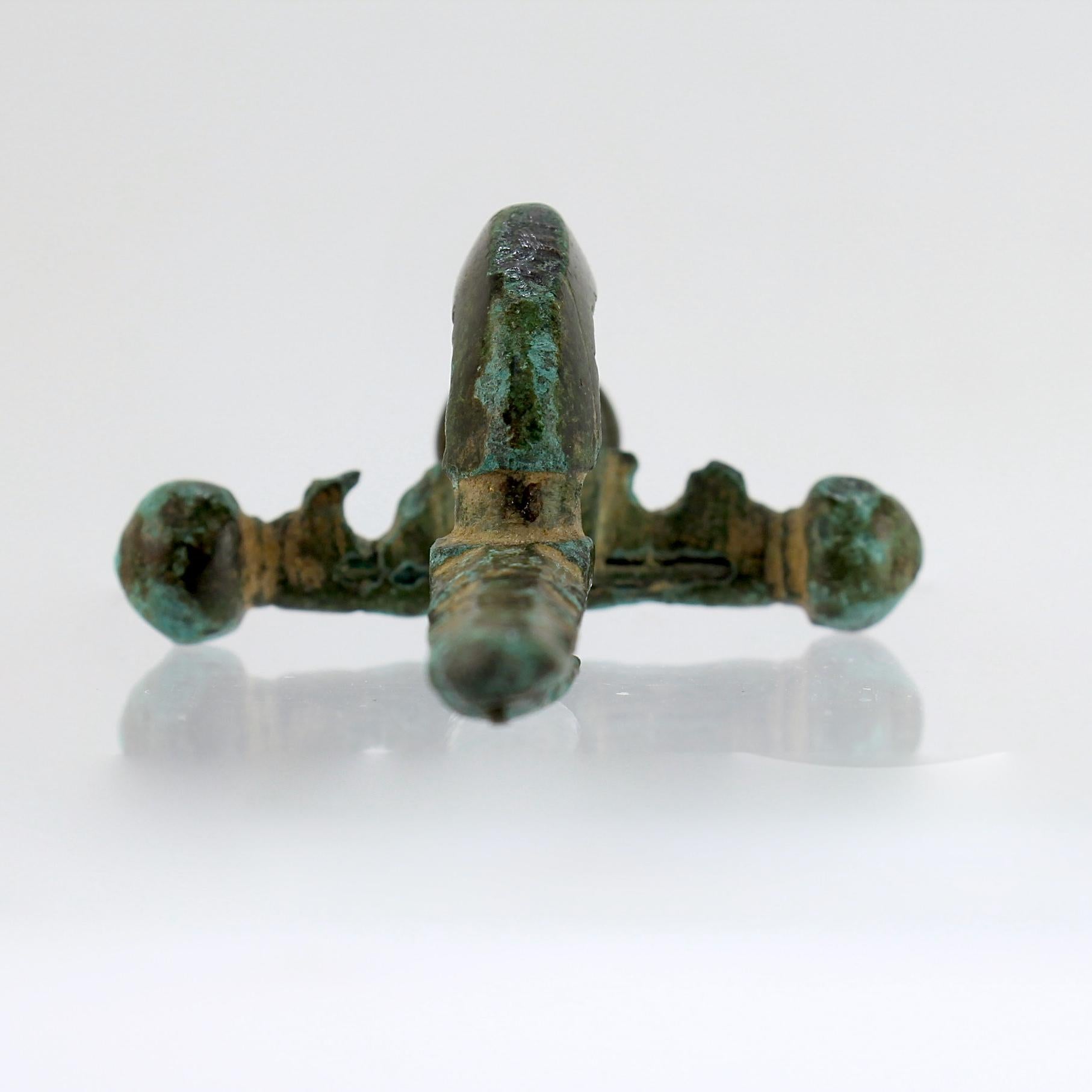 European Ancient Roman Bronze Crossbow Fibula or Toga Pin For Sale