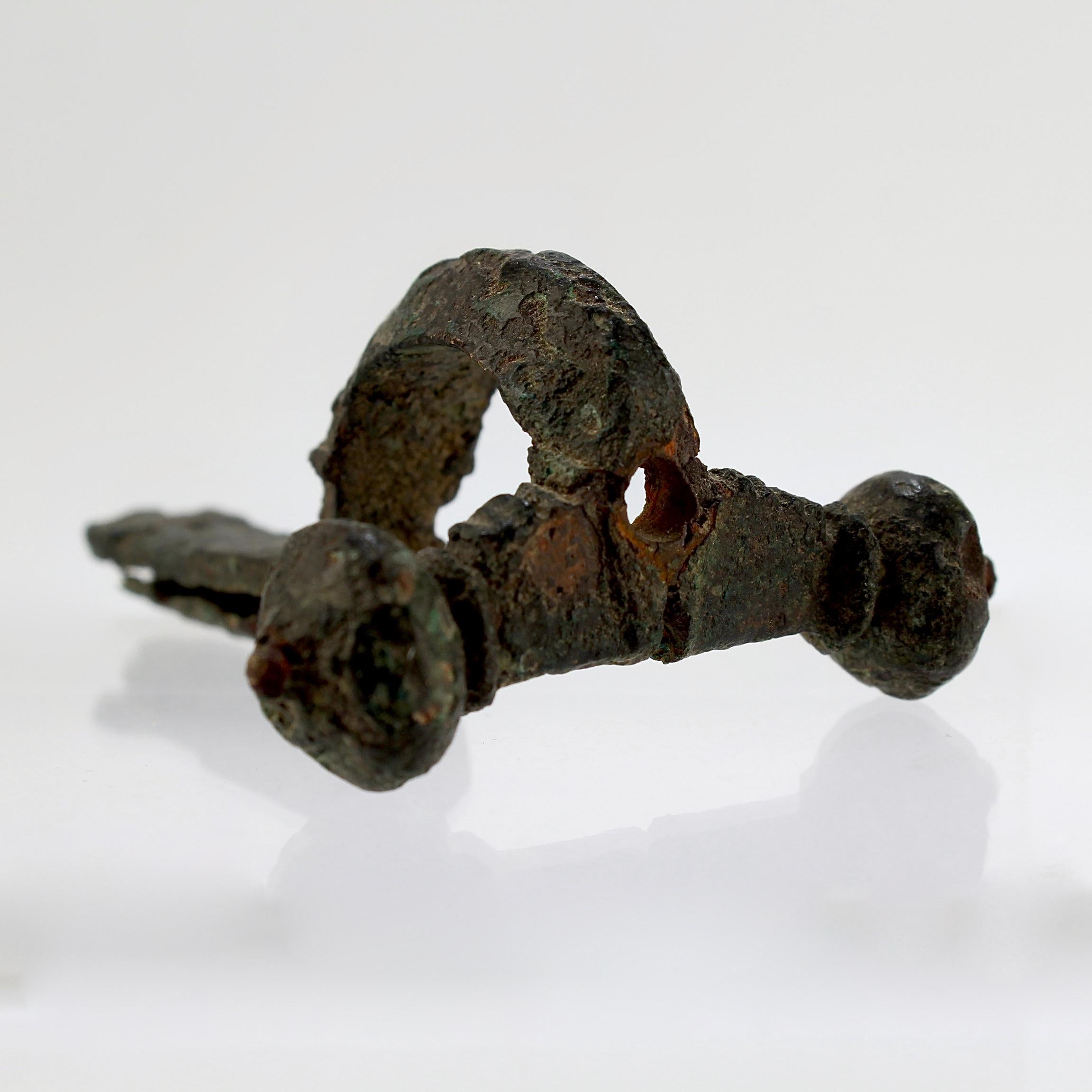 Ancient Roman Bronze Crossbow Fibula or Toga Pin In Distressed Condition For Sale In Philadelphia, PA