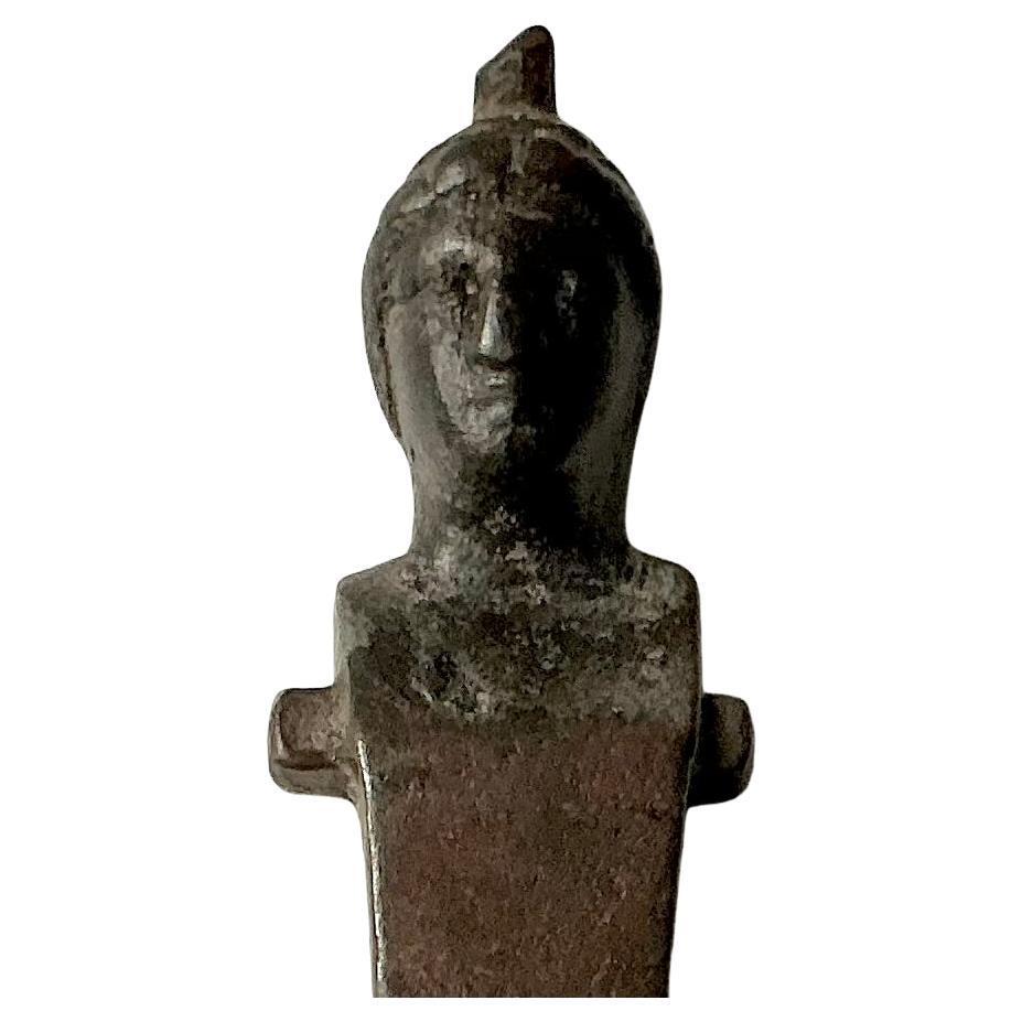 Ancient Roman Bronze Herm Statue dating from the 1st to 4th Century A.D. A herm was a statue consisting of a a head atop a square pillar, originally an artifact to honor the god Hermes. Originating in Greece as boundary markers dedicated to the god
