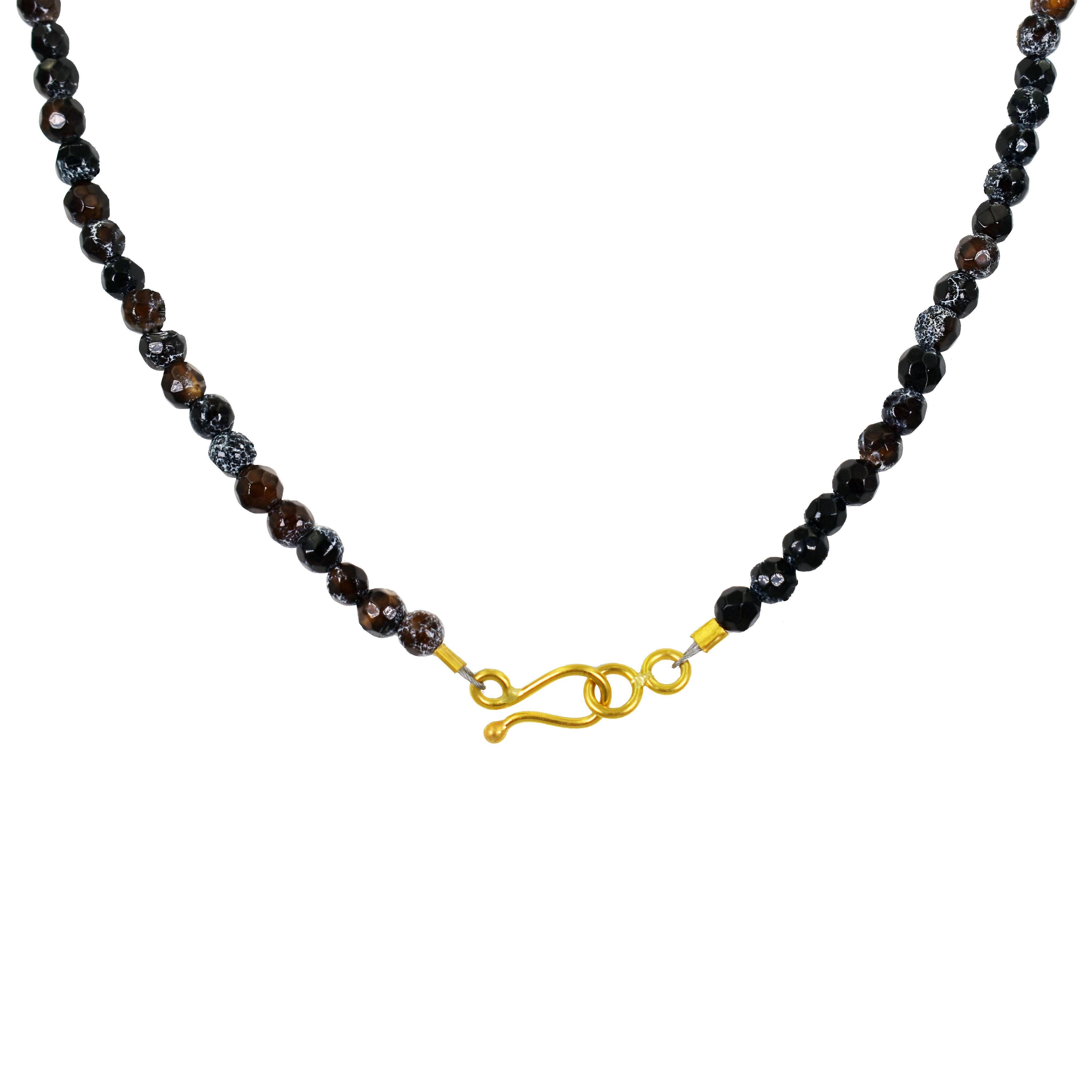 Authentic ancient Roman bronze key and 22k yellow gold dangle pendant on faceted Fire Agate beaded necklace. Beaded necklace is 15.75 inches in length. Dangle pendant is 1.69 inches in total length. Necklace is finished with a 22k gold hook closure.