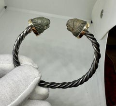 Bracciale a cerchio con leone in bronzo dell’antica Roma, II secolo d.C., oro 14 carati e argento
