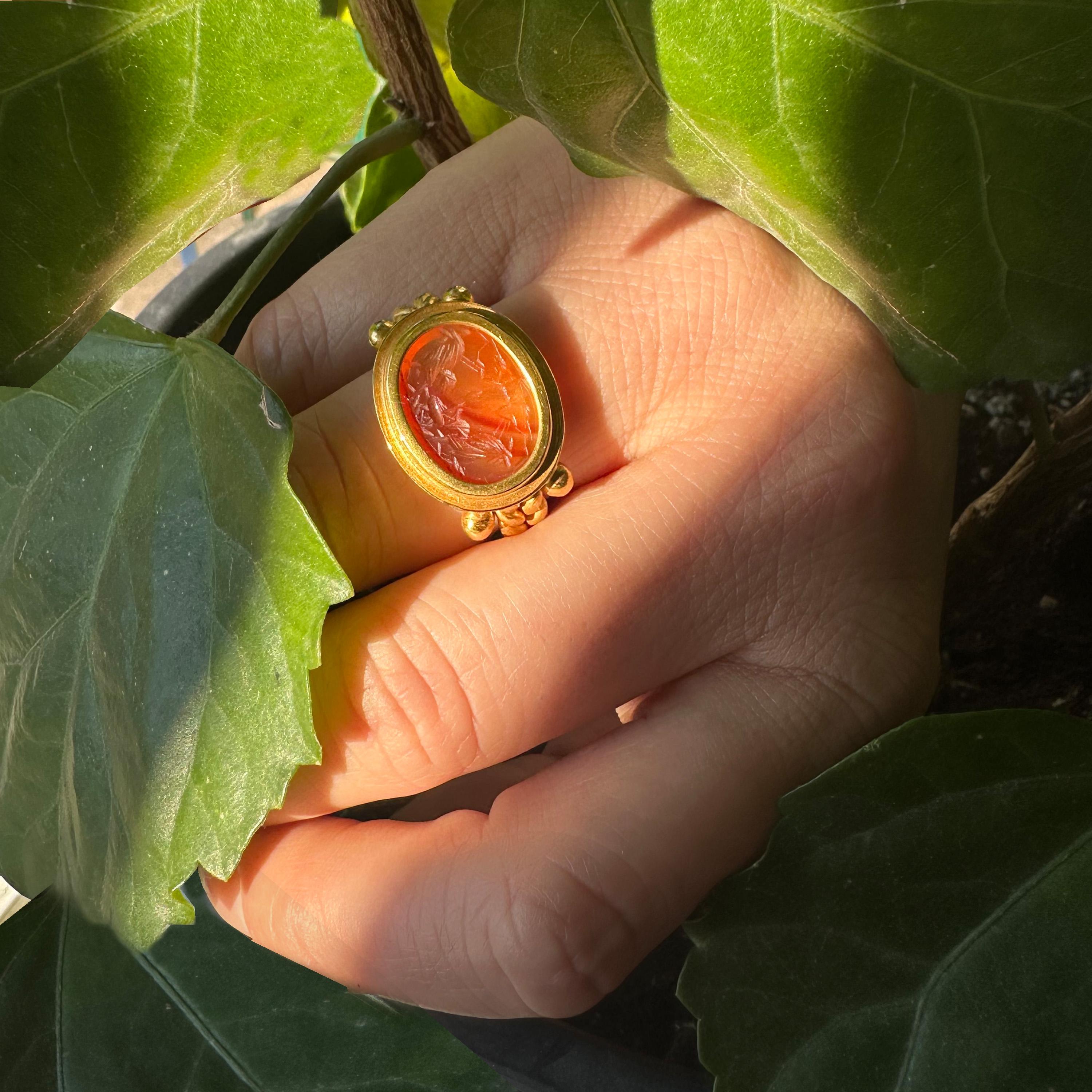 Oval Cut Ancient Roman Carnelian Intaglio 18Kt Gold Ring depicting God Eros and roosters For Sale