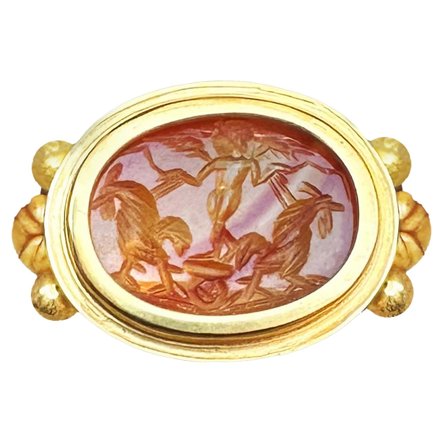 Ancient Roman Carnelian Intaglio 18Kt Gold Ring depicting God Eros and roosters For Sale