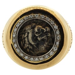 Anello d'oro con diamante e moneta romana antica