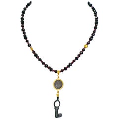 Ancient Roman Glass and Bronze Key 22 Karat Gold Garnet Beaded Pendant Necklace