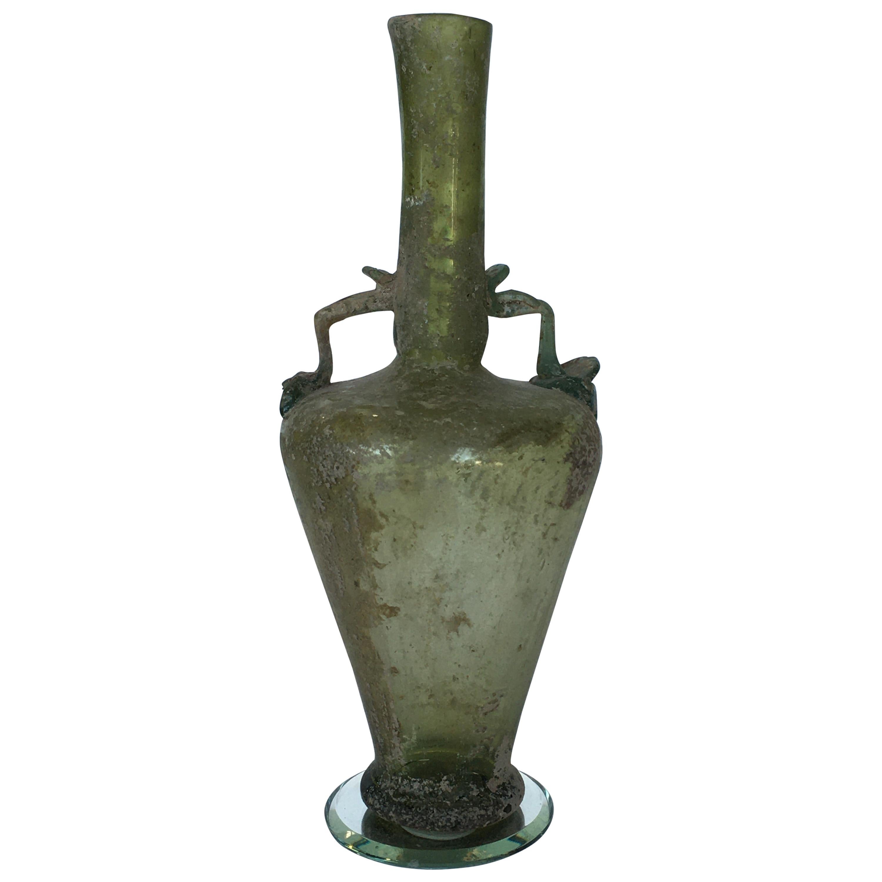 Bouteille en verre romaine antique en vente