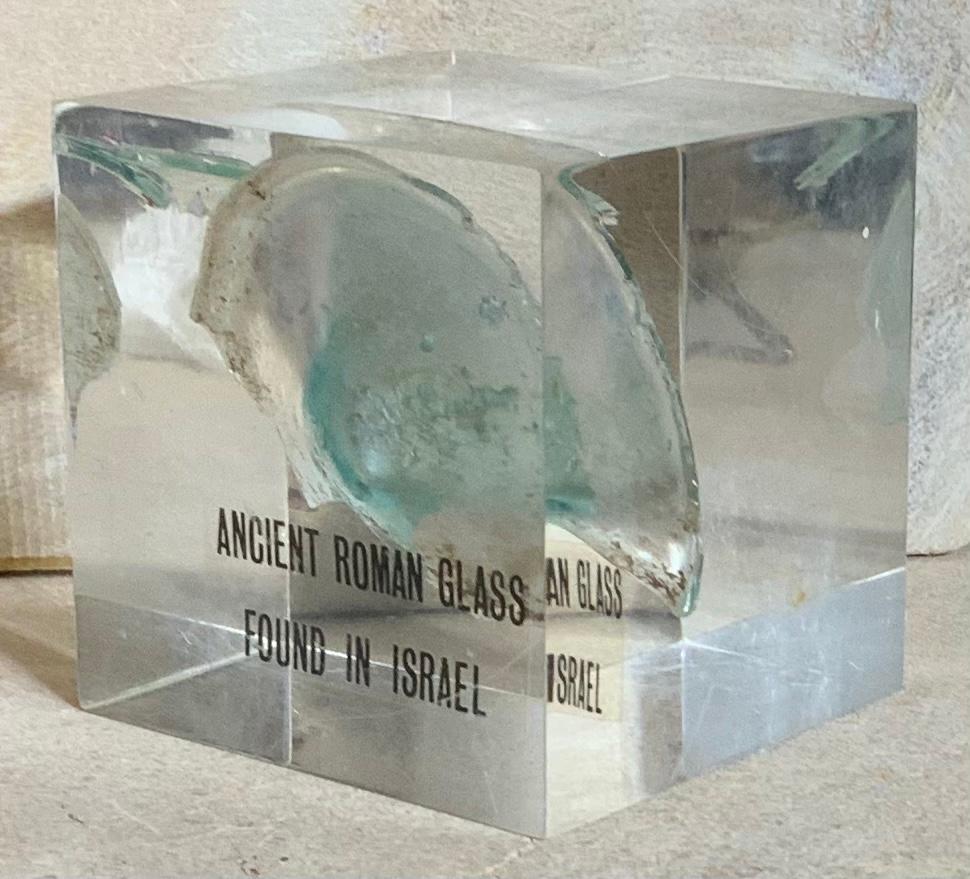 Beautiful original ancient Roman glass embedded in Lucite cube, was used for containing perfume. Exceptional object of art for display.