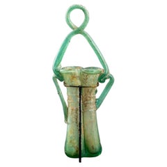 Unguentarium doble con asa de vidrio de la Antigua Roma