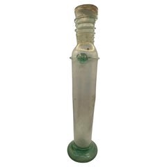 Antico vaso romano in vetro per bottiglie di profumo dell'Antica Roma