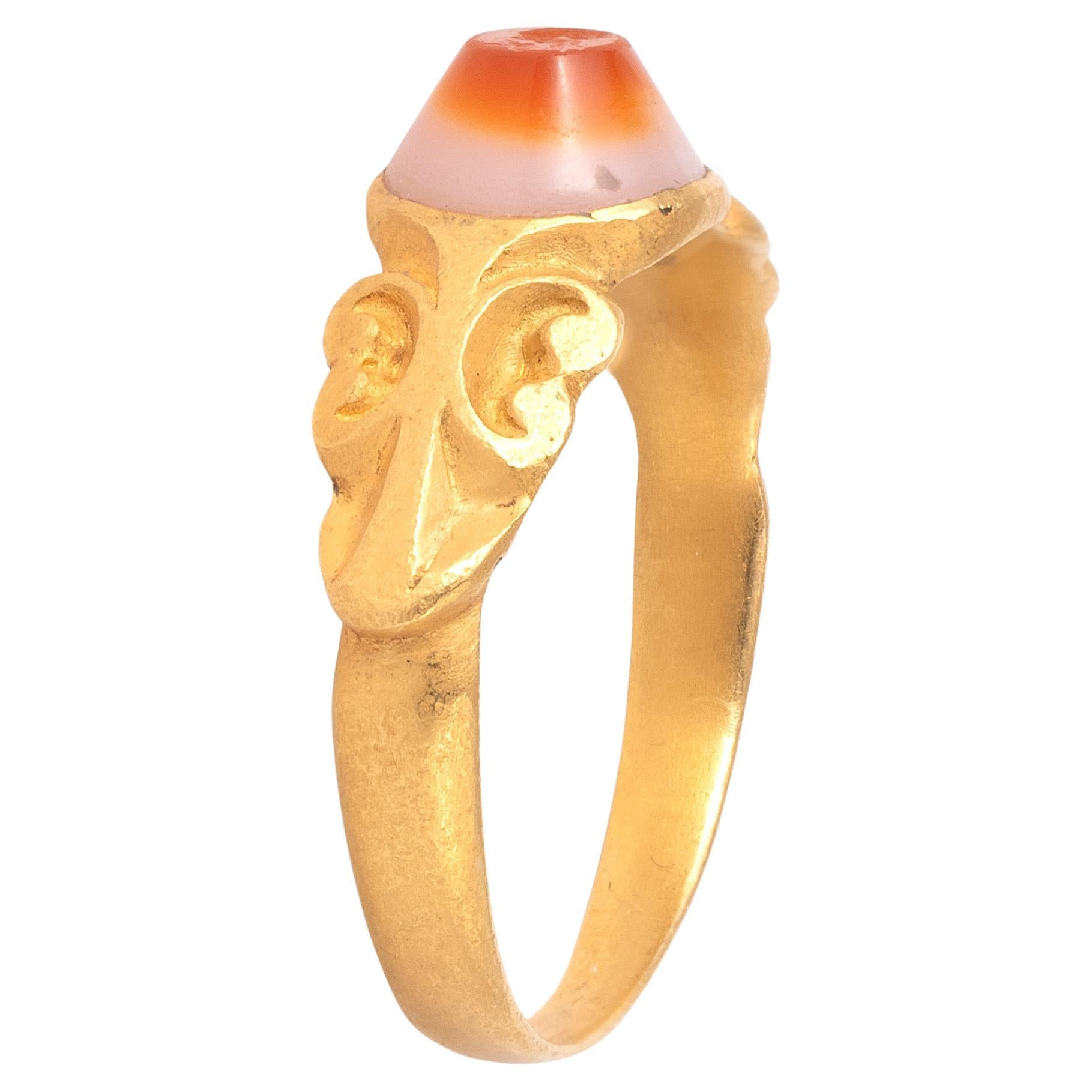 Uncut Ancient Roman Gold Banded Agate Intaglio Ring of a Hare and Shell For Sale