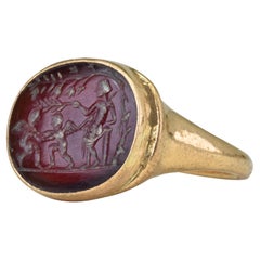 Ancient Roman Gold Intaglio Signet Ring with Venus and Two Fighting Cupids