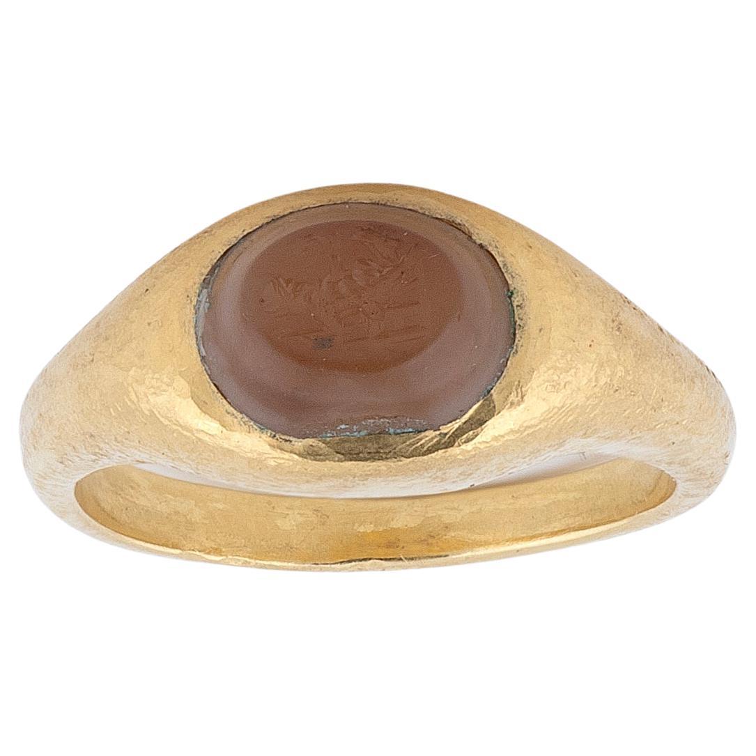 Anillo de oro romano antiguo para hombre Anillo calcográfico cónico Júpiter tallado en gema