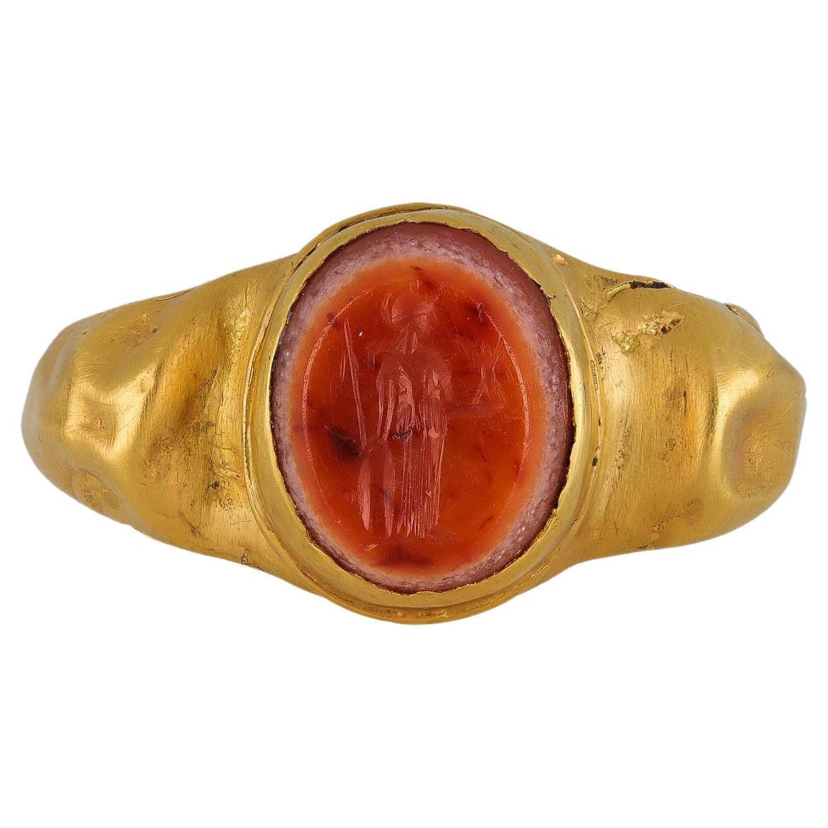 Ancient Roman gold ring with agate intaglio of Minerva, circa 2nd - 3rd century
