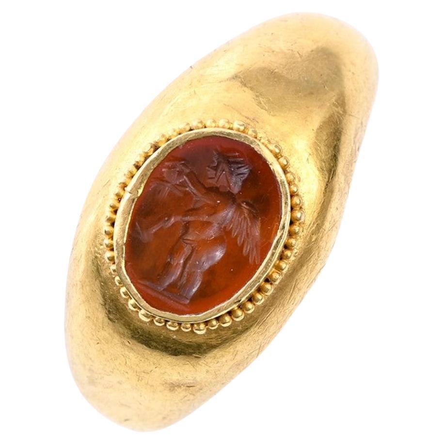 Ancient Roman Gold Ring with Eros Intaglio 2rd Century AD For Sale