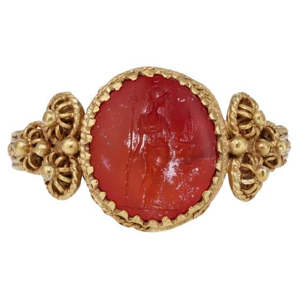 Classical Roman Ancient Roman Gold Ring with Minerva Intaglio 2rd Century AD For Sale