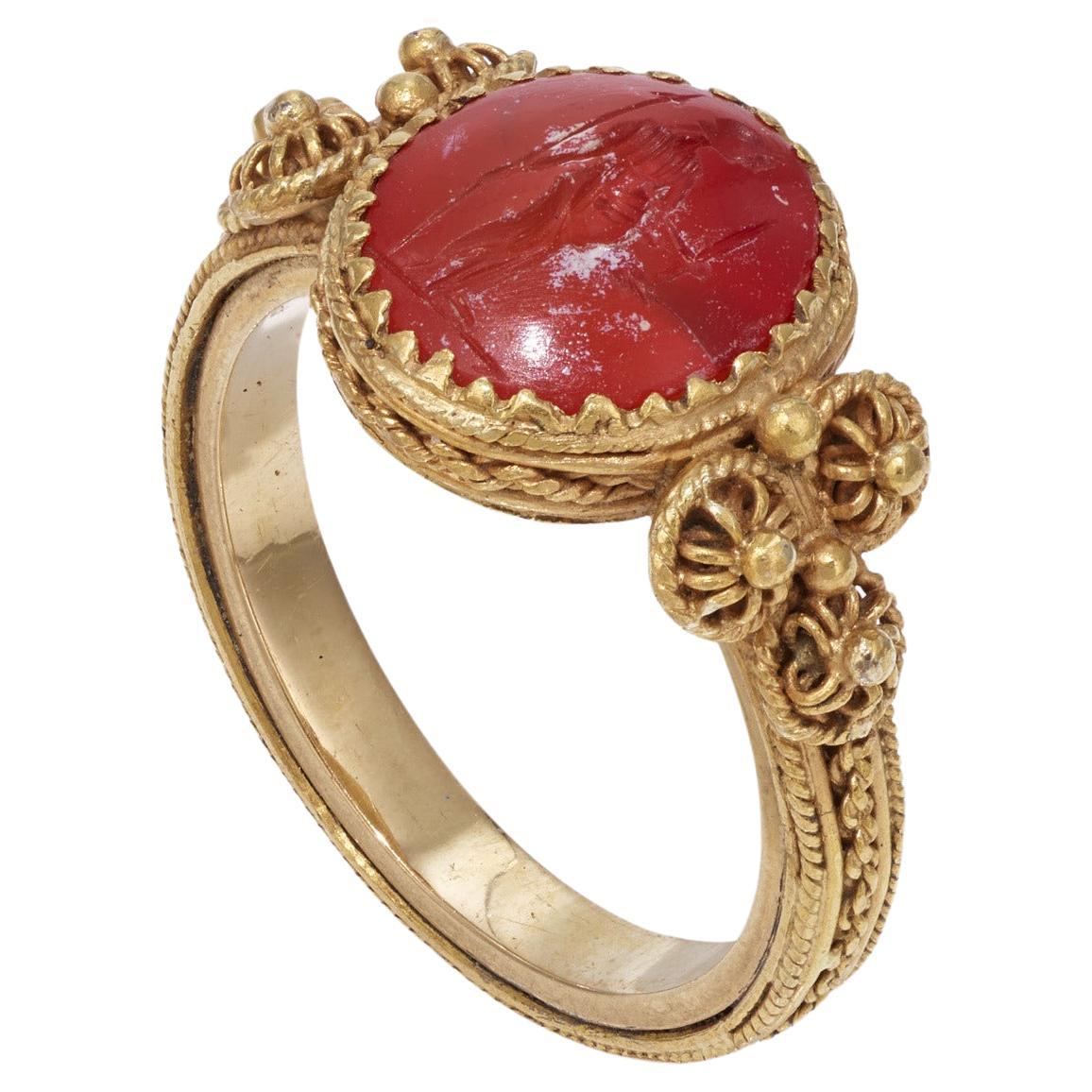 Uncut Ancient Roman Gold Ring with Minerva Intaglio 2rd Century AD For Sale