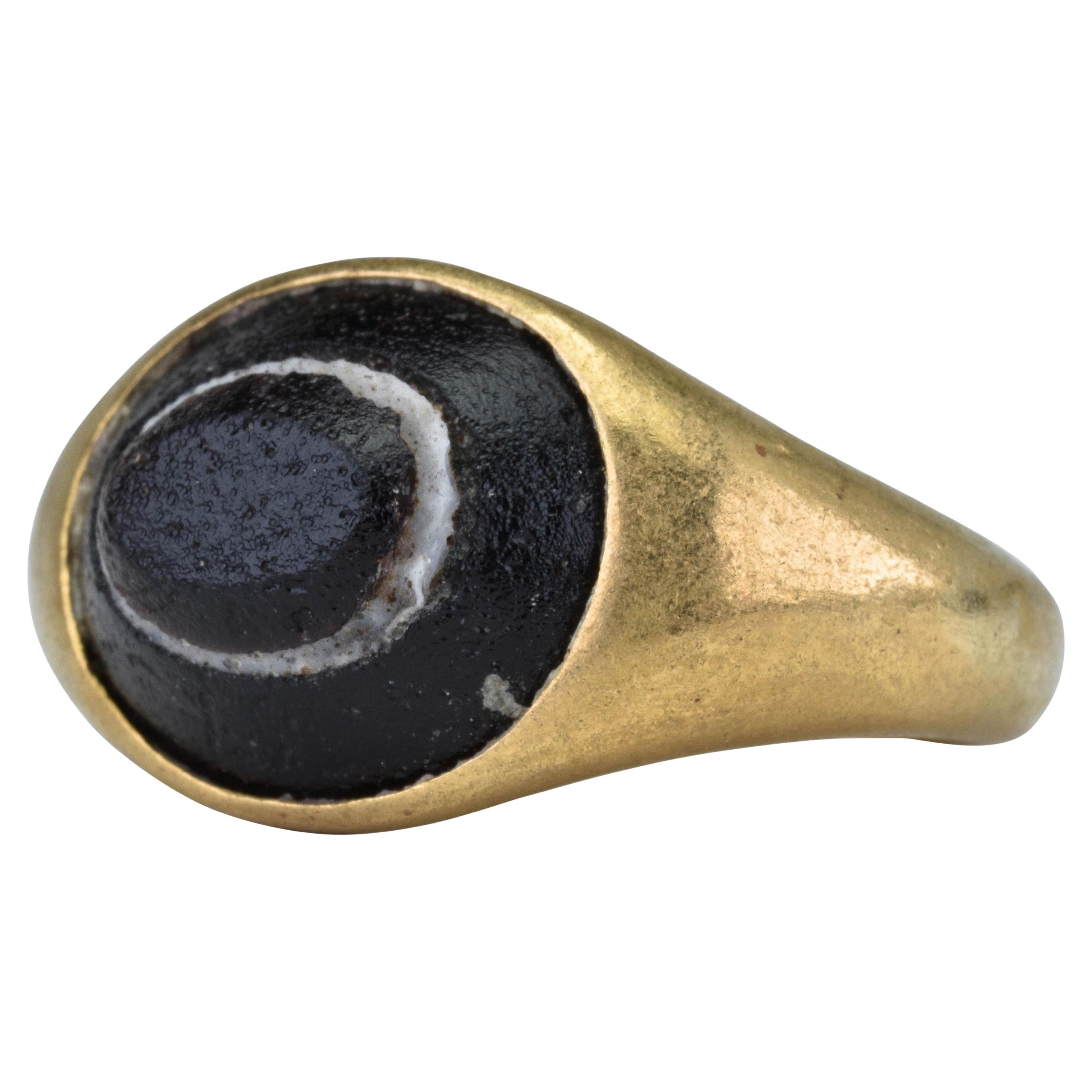 Ancient Roman Gold Signet Ring Inlaid with a Glass "Eye" Cabochon