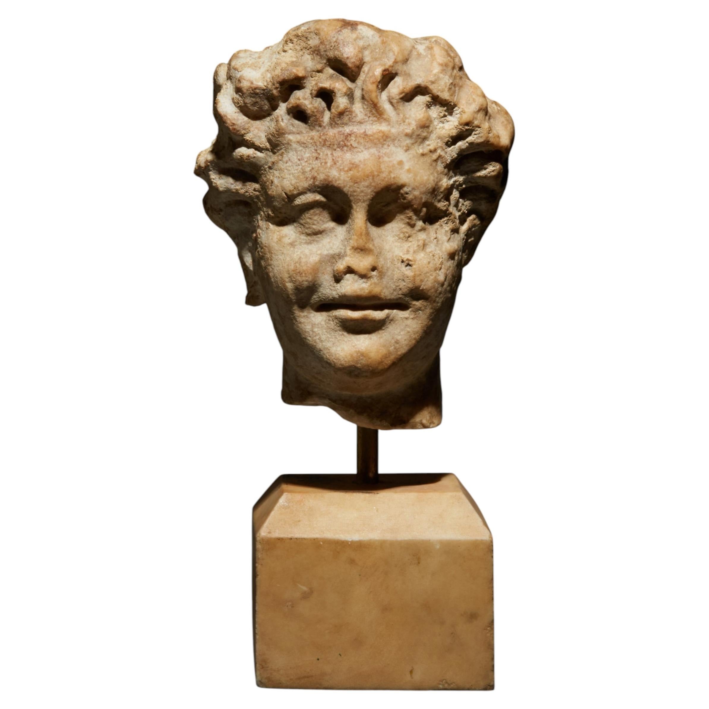 Ancient Roman Head of a Satyr in Marble For Sale
