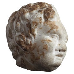 Ancient roman Head of Eros, in white marble, circa 2nd - 3rd century A.D