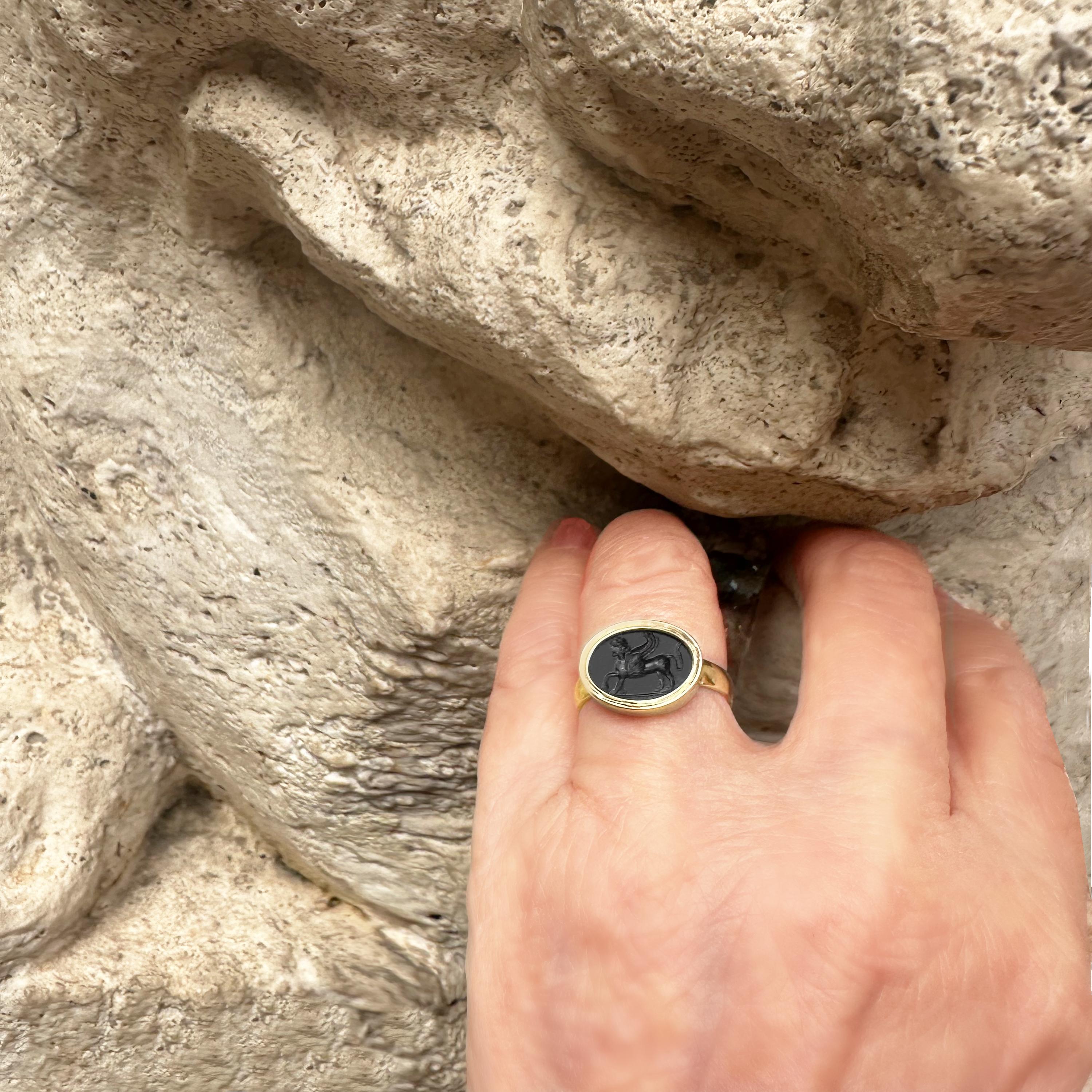 Classical Roman Ancient Roman intaglio 1st-2nd Cent. AD 18 Kt Gold ring depicting a Sphinx For Sale