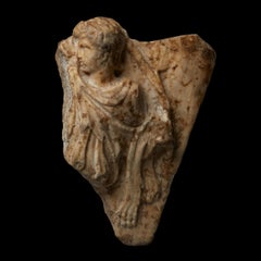 Relief romain antique avec un satyre en marbre