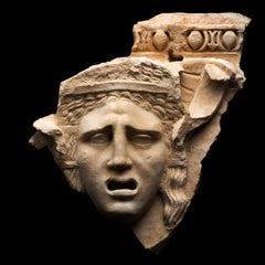 Ancient Roman Relief with theatre mask in marble