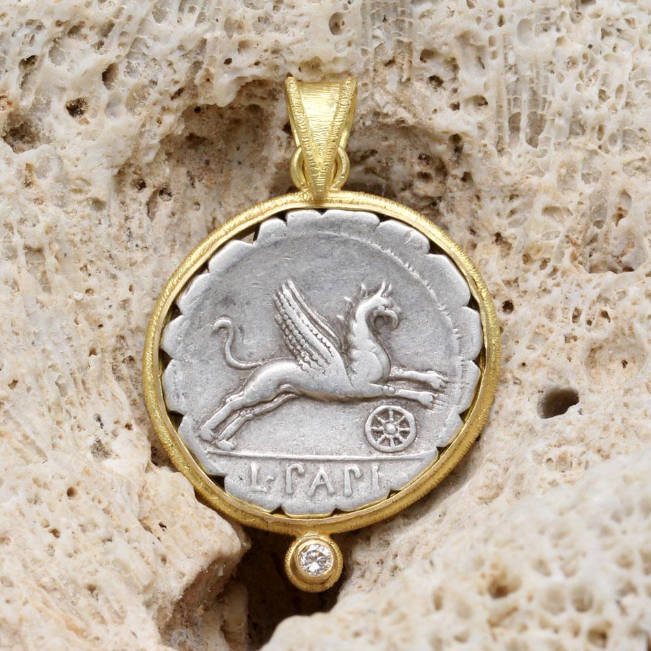 An interesting, authentic, silver denarius coin from the period of the Roman Republic in 79 BCE, featuring a griffin leaping, is set in a Steven Battelle ancient inspired handmade matte-finish textured bezel mount with 1.8mm VS1 diamond accent.  The