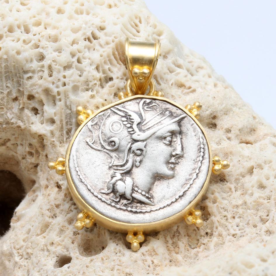 An authentic silver denarius coin minted between 110 - 109 BC displays a beautiful depiction of the goddess 