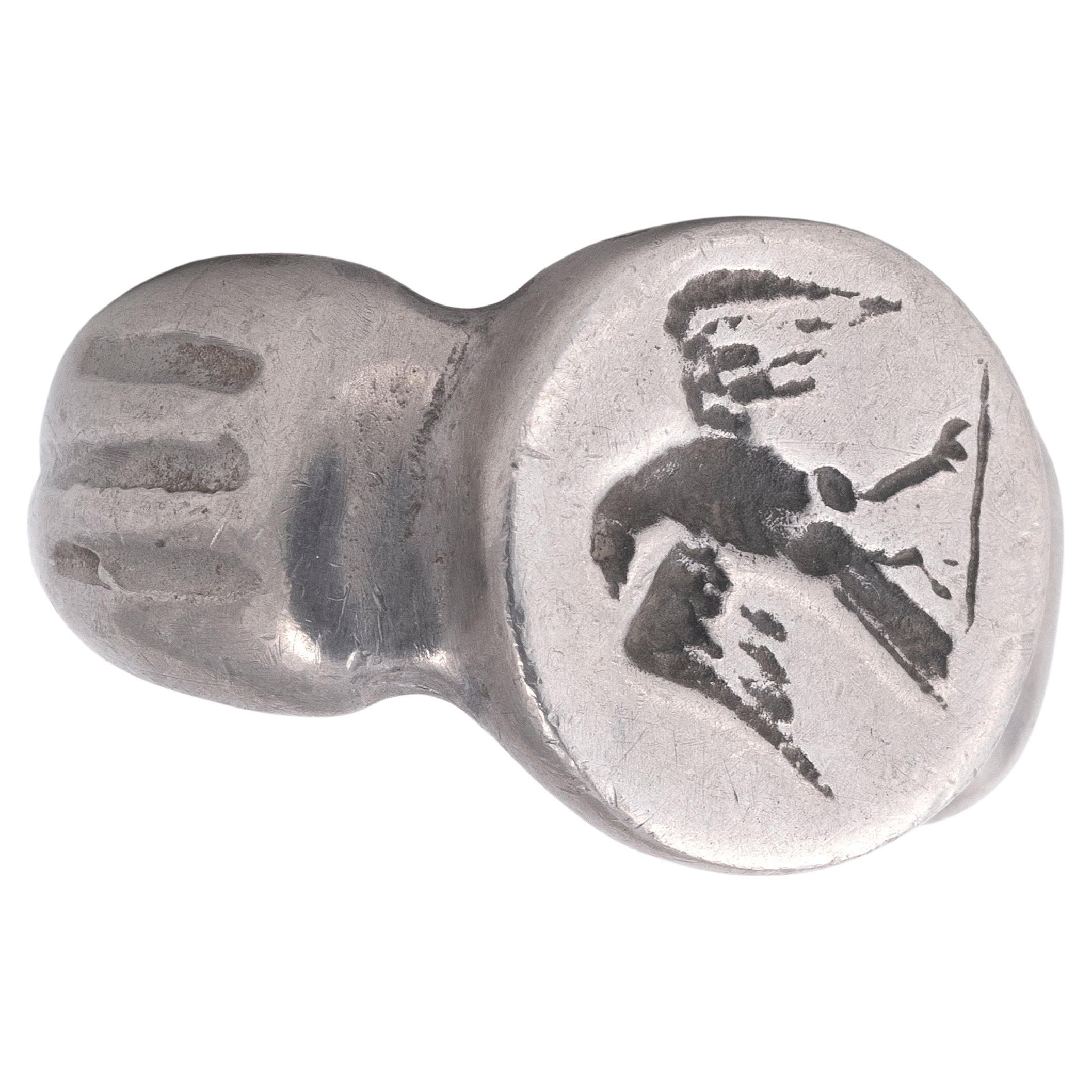 Roman Legionary silver ring. Wide angled shoulders, the oval bezel with an engraved eagle.
Size: 11
Weight: 19.8gr.
Date: Circa 1st Century AD
In Ancient Rome spotting an eagle in the sky was considered a symbol of good luck and assistance from the