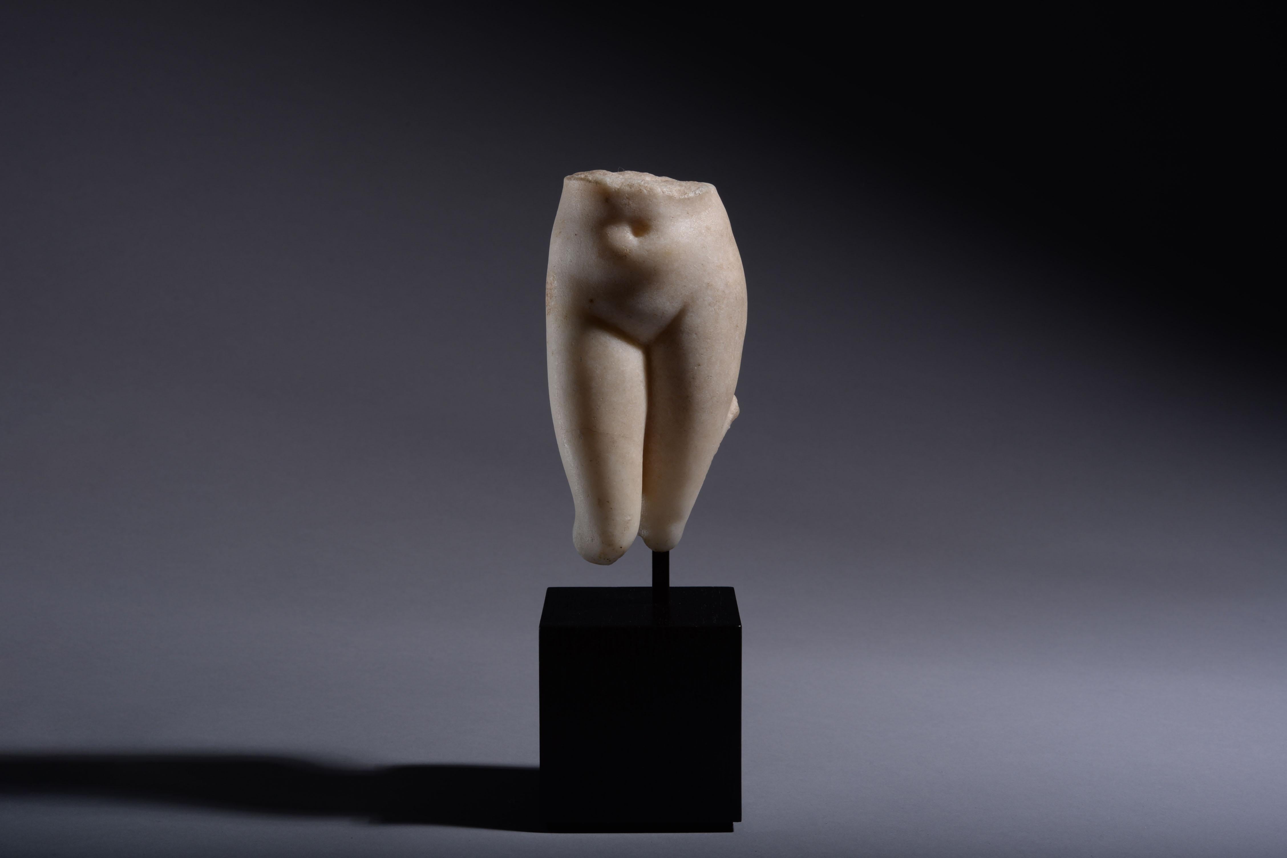 Graeco-Roman torso of Aphrodite, after the Aphrodite of Knidos by Praxiteles 
Circa 1st Century A.D.

With sensitively modelled body, standing with her weight on her left leg, her right forwards and bent at the knee, traces of an attachment on