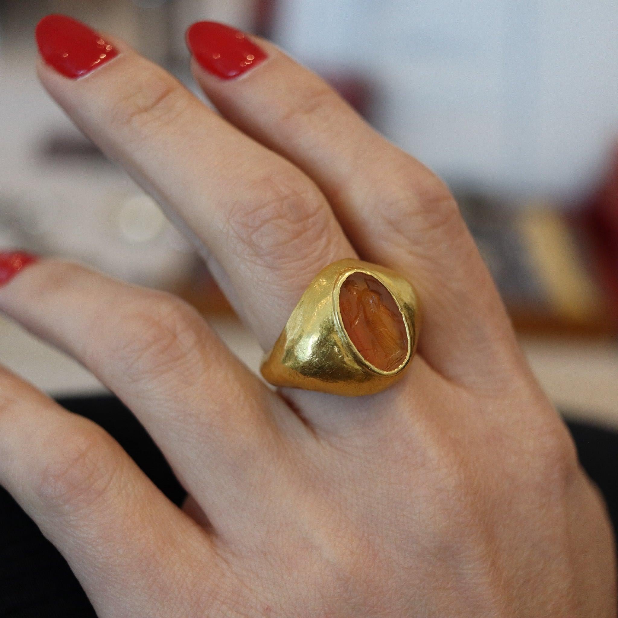 An ancient Roman signet intaglio ring.

This is an exceptional and beautiful historical ring, created during the ancient Roman Empire, circa 100-200 AD. This rare one-of-a-kind intaglio signet ring, was masterfully crafted with plain smooth surfaces