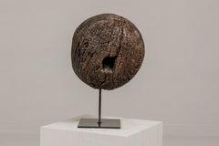 Ancient Rustic Cart Wheel Mounted on Black Lacquer Base