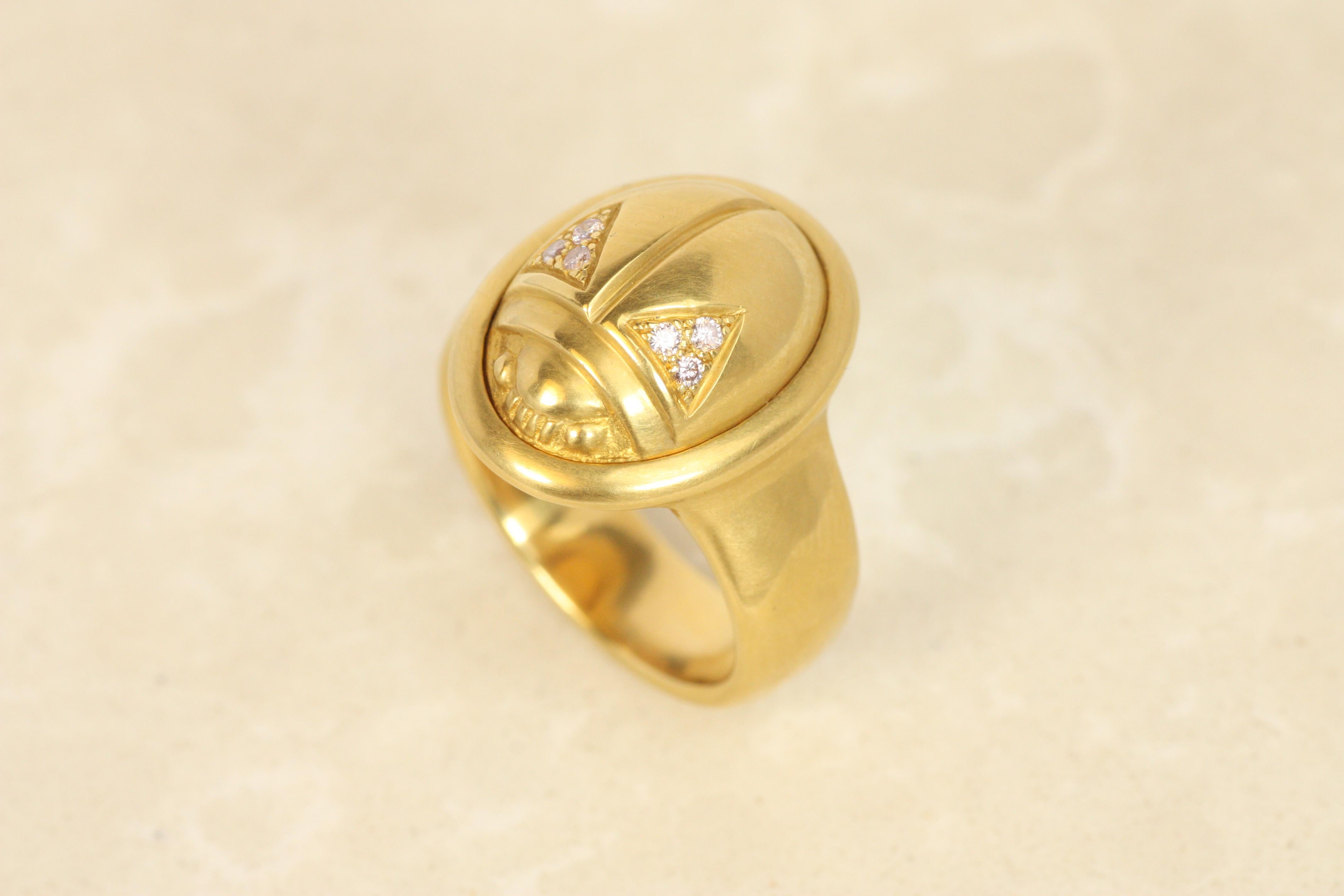 This extraordinary one-of-a-kind ancient style scarab ring is crafted in solid 22K yellow gold and is a masterpiece from the Darlene deSedle collection. The scarab’s wings are adorned with natural pink diamonds, adding a rare and enchanting touch to