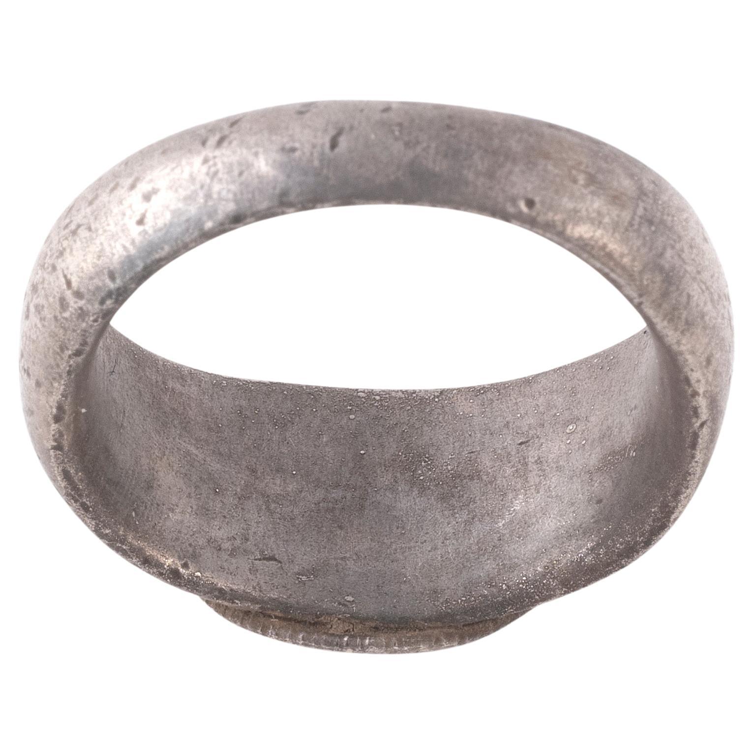 An Ancient silver and high karat gold phallic ring.

Roman, 2nd /3rd century AD.

Ring size 8 US.

It’s a substantial ring and weight 9.87 grams.
