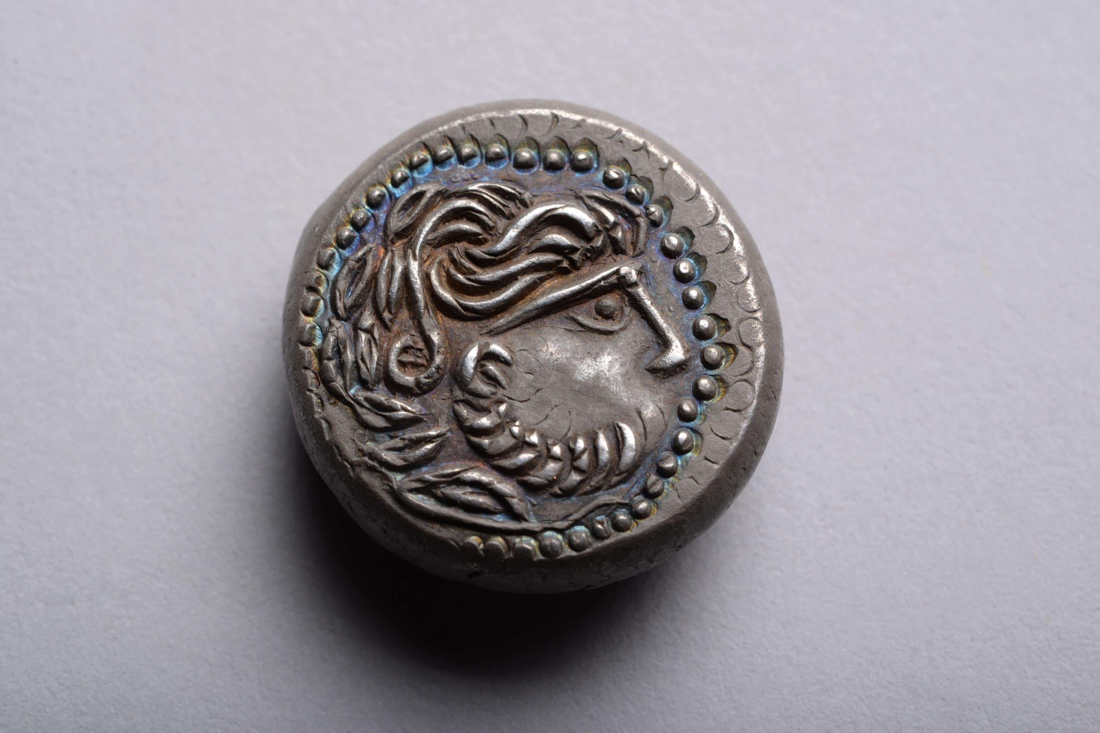 Celtic ‘Dachreiter’ Tetradrachm
Minted in Eastern Europe, circa 1st-2nd Century B.C.
Silver

A magnificent Celtic tetradrachm of the Dachreiter (“roof-rider”) type, minted by a Celtic tribe in Eastern Europe. The obverse with a delightfully