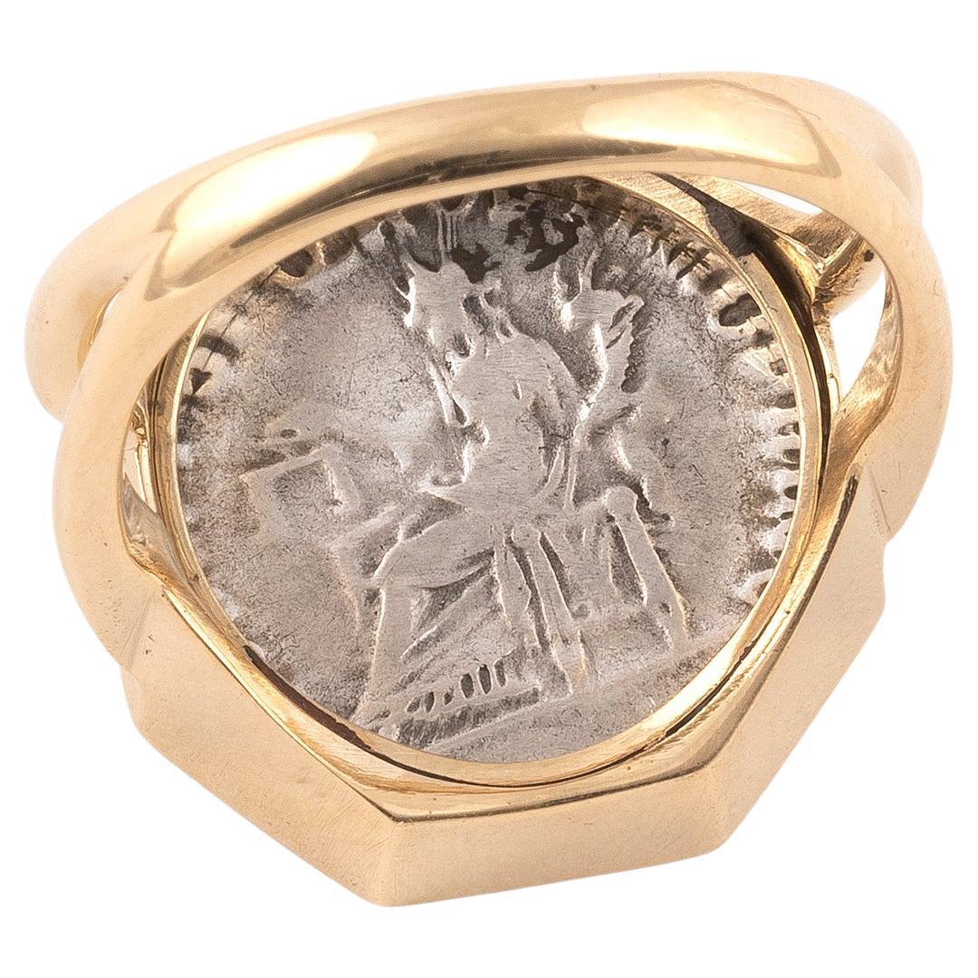 

Traiano, 98-117 D.C. Denario Silver. Octagonal shape ring in 18kt yellow gold. 
Size: 7 
Weight: 12 gr.