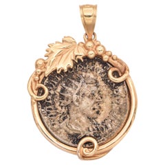 Colgante de moneda romana de plata antigua en oro amarillo de 14 quilates