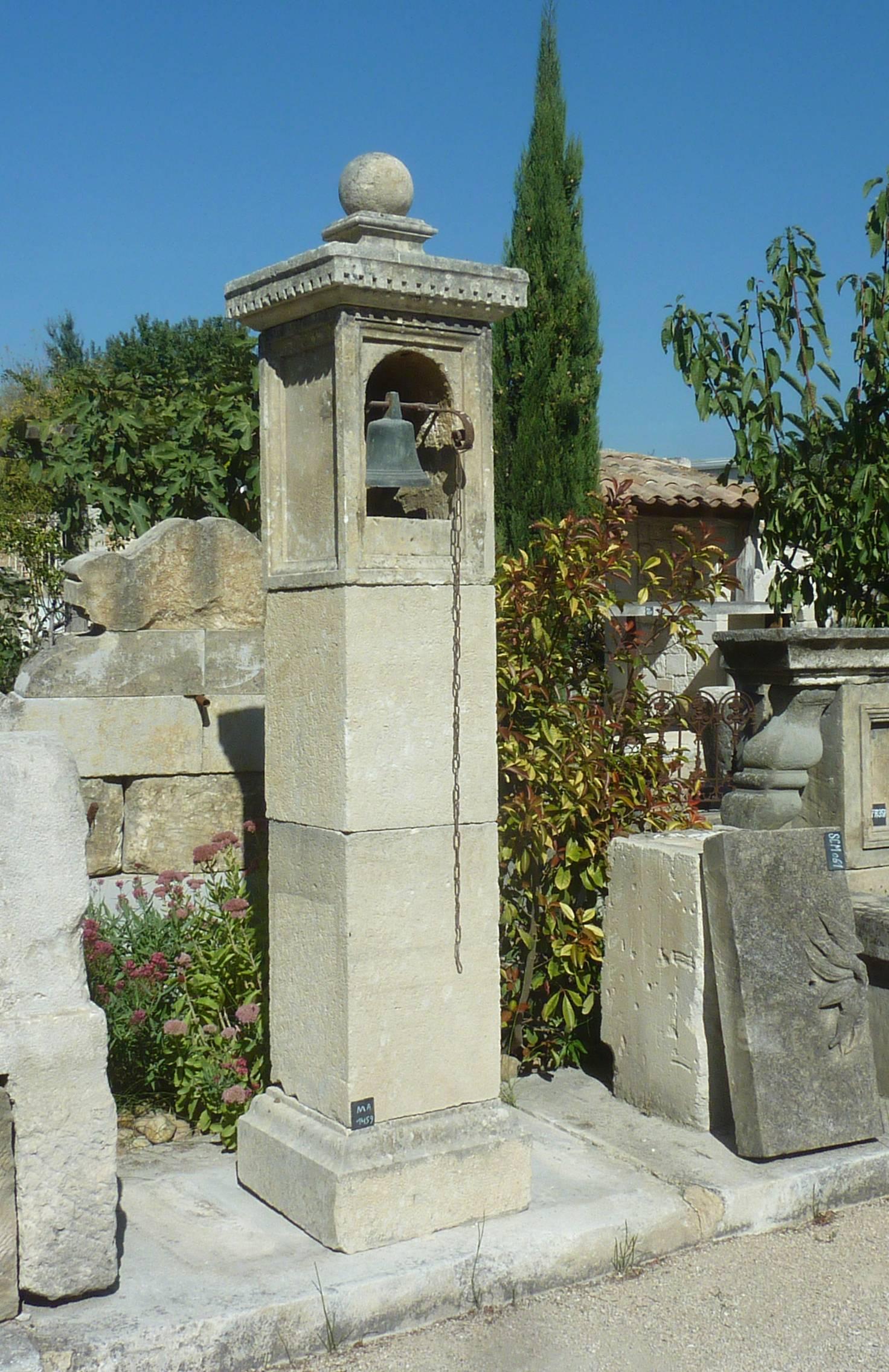 This magnificent ancient pillar has been crafted in the 19th century in natural French limestone. The stone shows now a beautiful patina and wear and tear of time.

This one of the kindbell pillarl is composed of a thick molded monolithic base, of