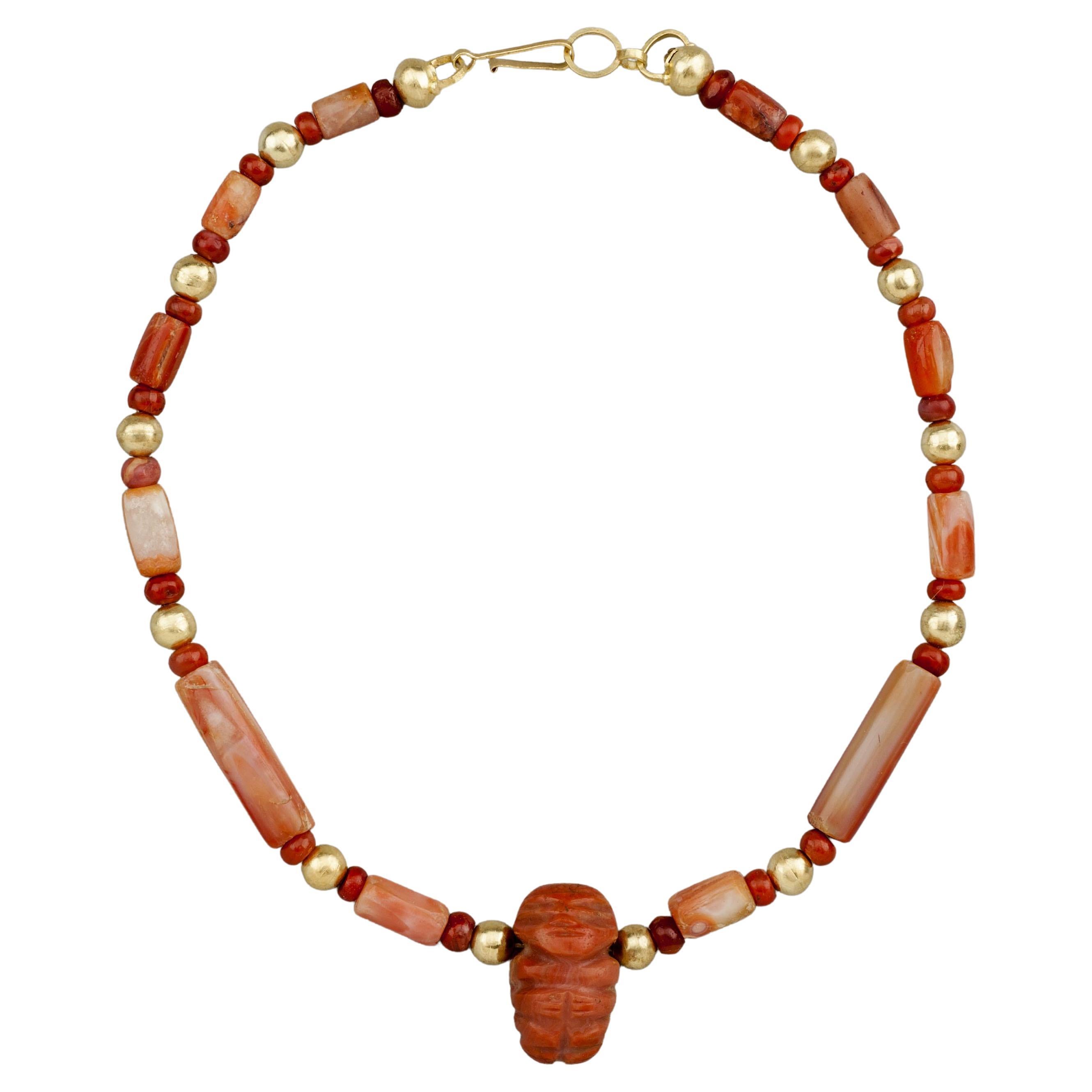Ancient Tairona Carnelian Effigy Pendant with 20k Gold Beads and Clasp For Sale
