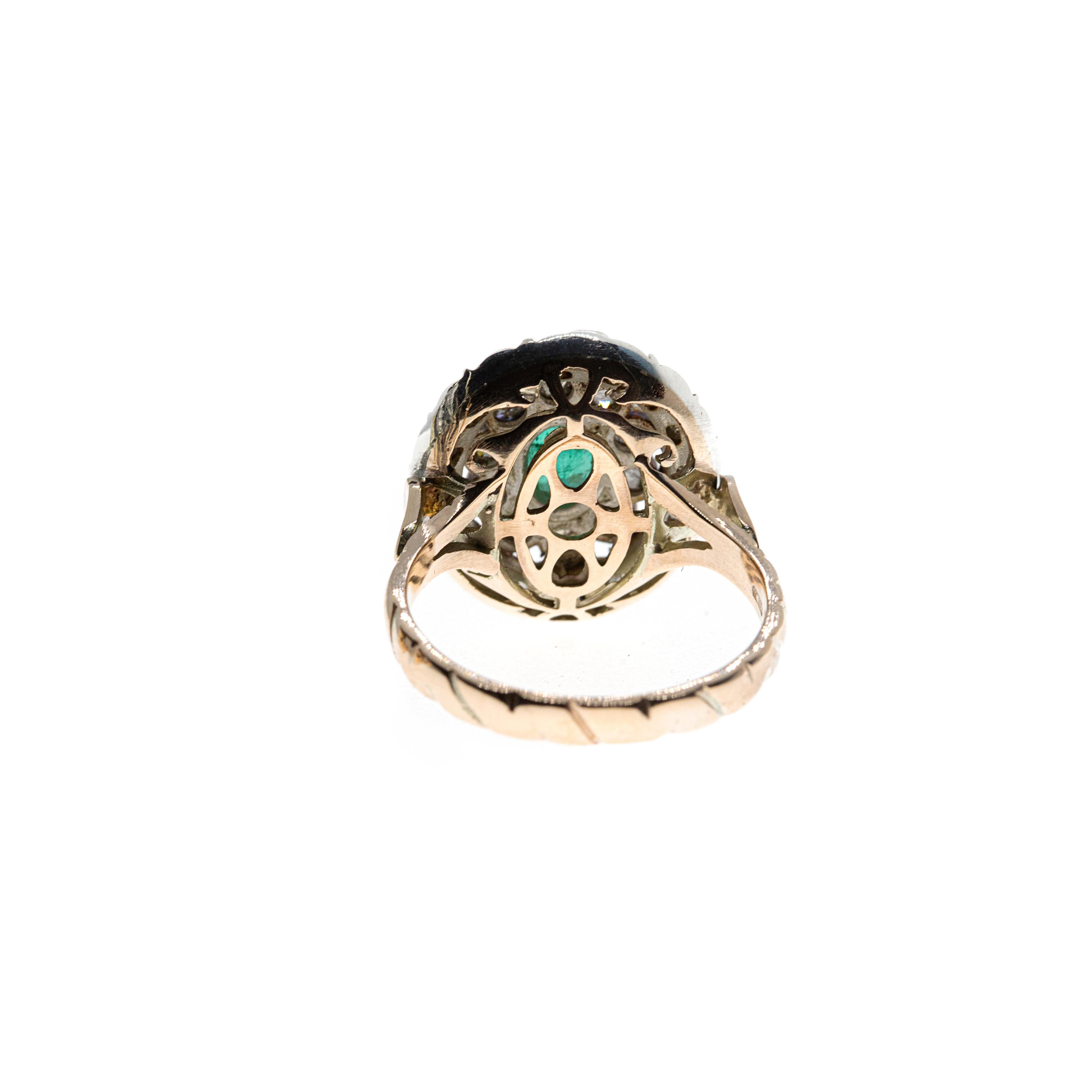 Understated and elegant, and yet 600-odd years in the making. A half-carat emerald and a double halo of rose-cut white diamonds are set into 9-karat rose gold and blackened .925 silver. The piece is produced using an ancient Albanian technique that