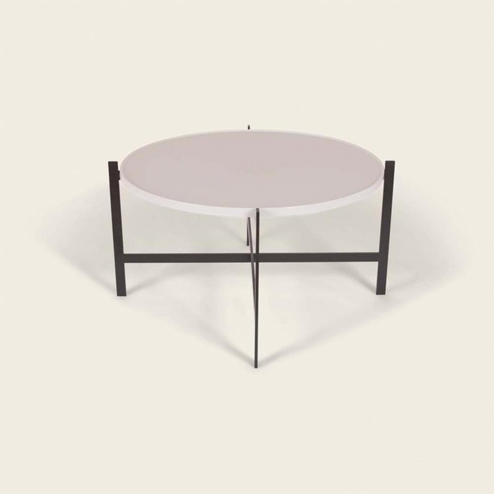 Ancient white porcelain large deck table by Ox Denmarq
Dimensions: D 87 x W 87 x H 45 cm
Materials: steel, porcelain
Also available: different size and top options available.

Ox Denmarq is a Danish design brand aspiring to make beautiful