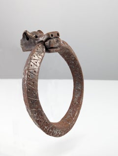 Ancient wrought iron door knocker with dragon head