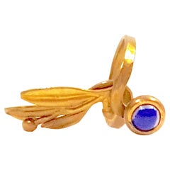 Antiker griechischer skulpturaler Ring mit durchbrochener Lünette und Lapislazuli-Cabochon