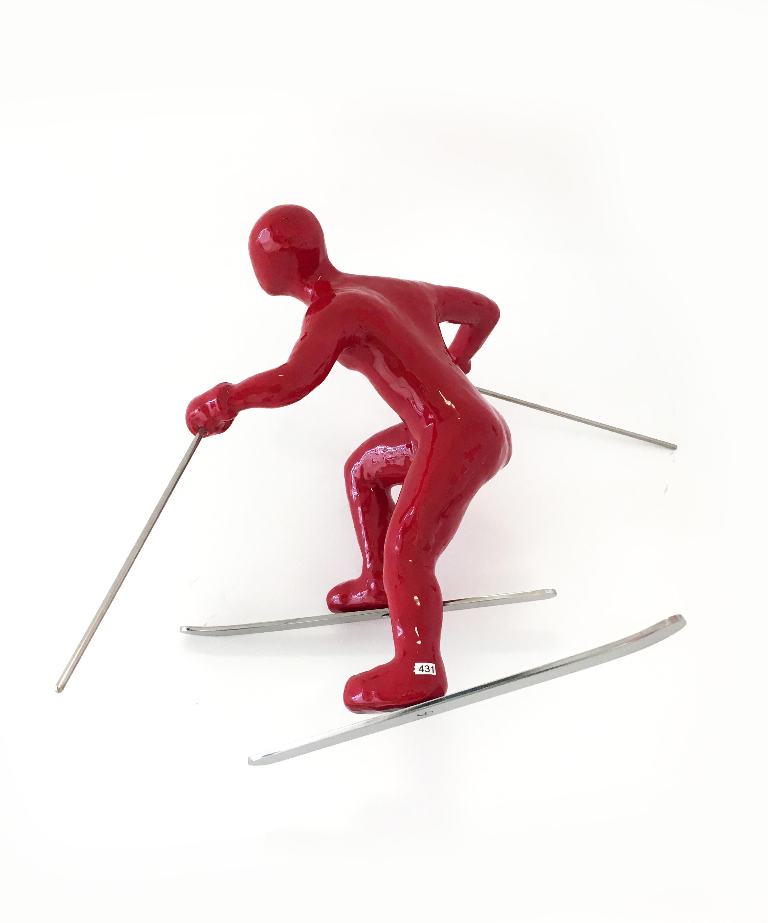 Ancizar Marin Figurative Sculpture - Skier (Red), Resin