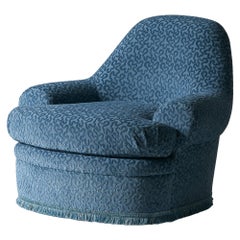 Fauteuil en osier, velours bleu vénitien